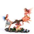 Cute Flower Fairies Playing on Seesaw Figurine