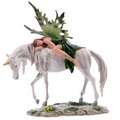 Decorative Green Woodland Fairy Resting on Unicorn