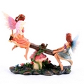 Cute Flower Fairies Playing on Seesaw Figurine