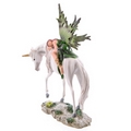 Decorative Green Woodland Fairy Resting on Unicorn